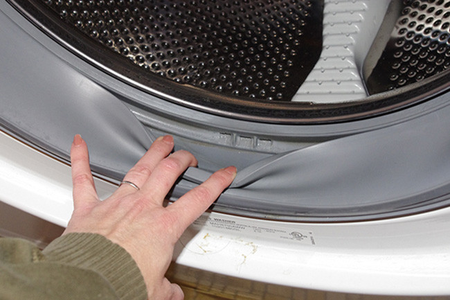 Máy giặt bị tran do ống cao xu